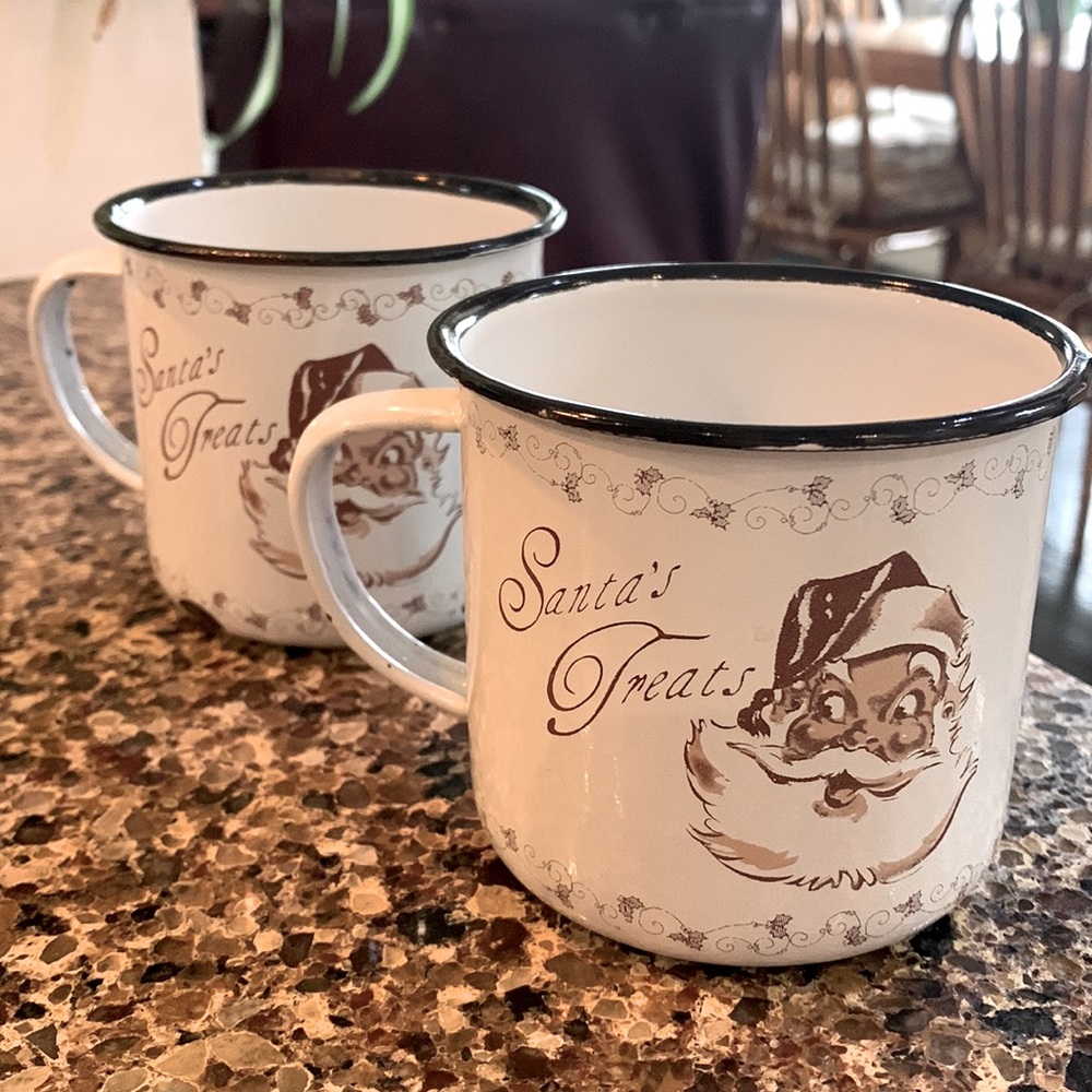 Two Vintage Enamel Santa Mugs